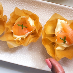 Phyllo cups filled with a cream cheese filling and topped with Salmon