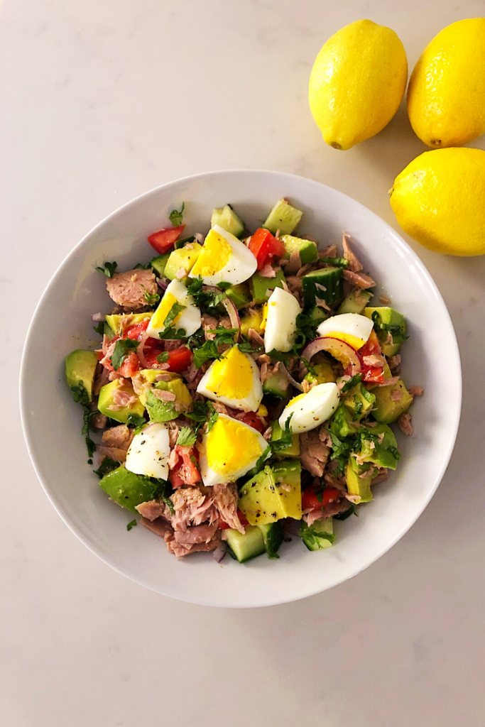 Summer salad with tuna, avocado and egg