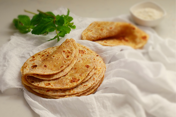 Soft Brown Rotis placed on a white cloth