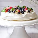 Easy Pavlova on a white cake stand