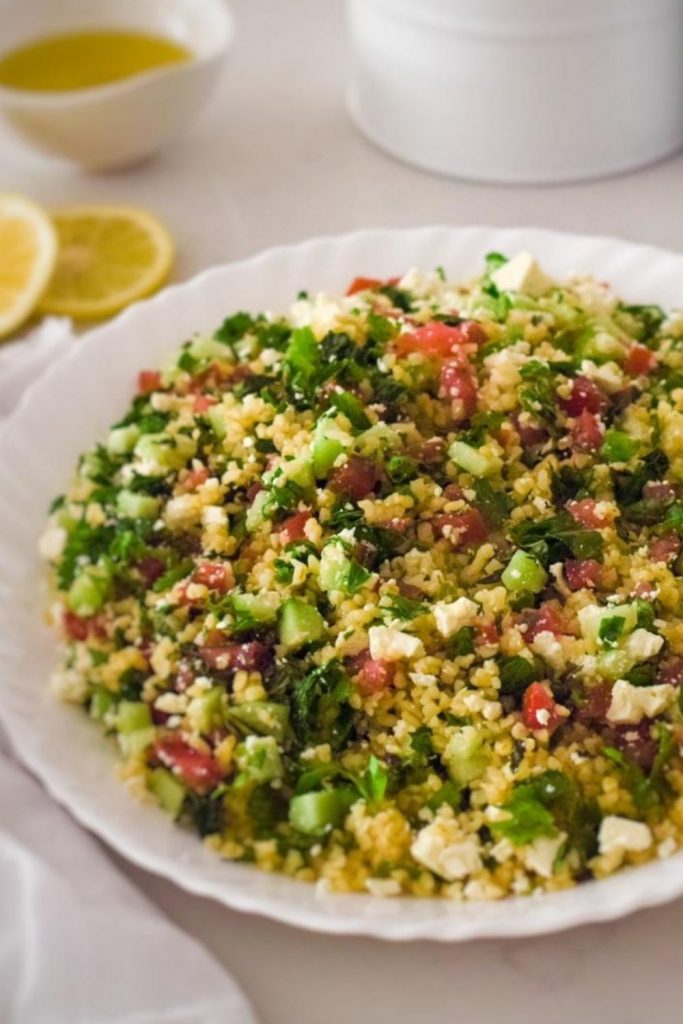 Tabbouleh lebanese salad on a white platter