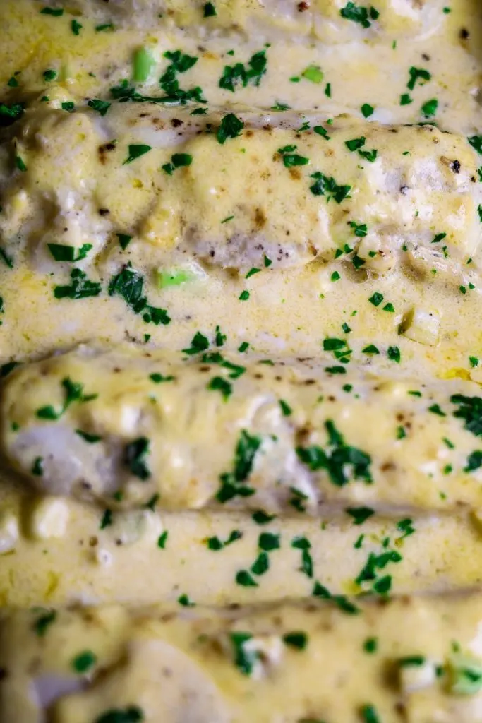 Baked fish smothered in lemon butter sauce