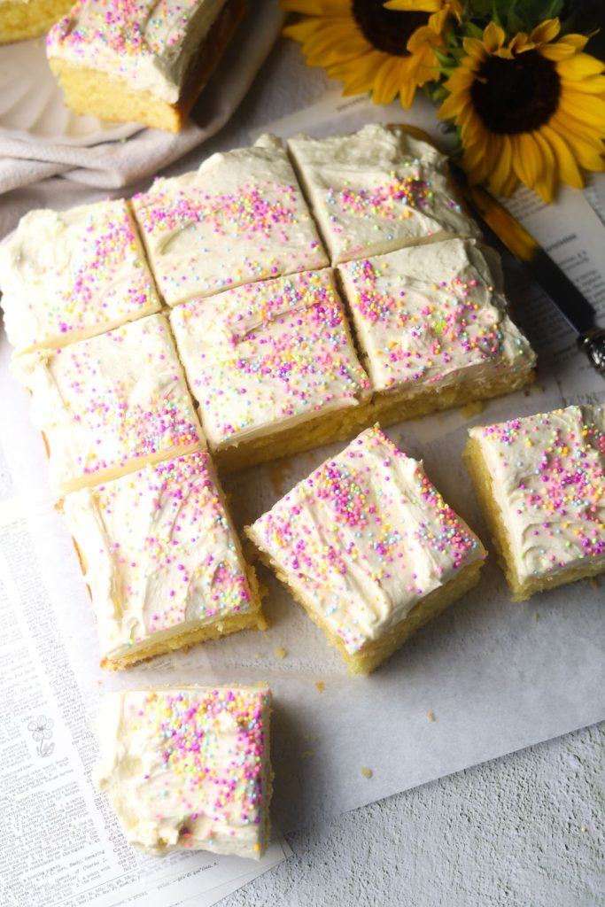 Vanilla Sponge Cake cut into squares on white paper